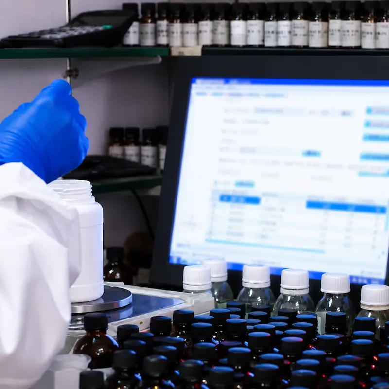 Perfumer workstation with aroma bottles and formulation software